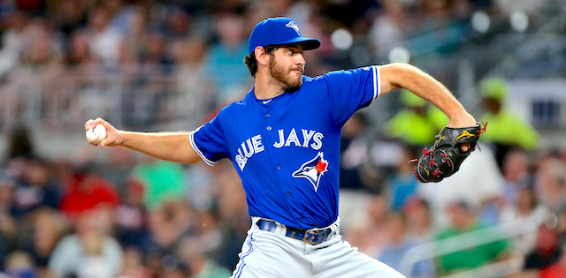 Jordan Romano of the Toronto Blue Jays pitches during the Spring