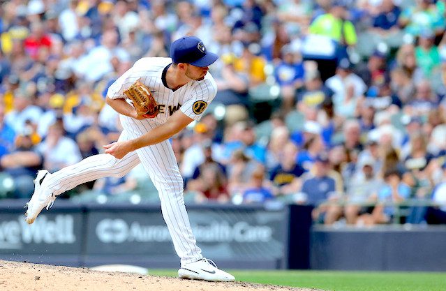 Brewers agree to extended deal with pitcher Aaron Ashby, add