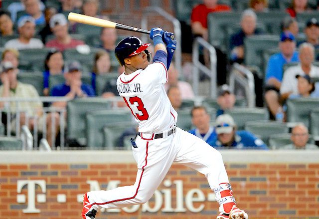 Salvador Perez wears Tom Brady jersey after bet with Brett Phillips